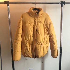 Yellow puffer jacket